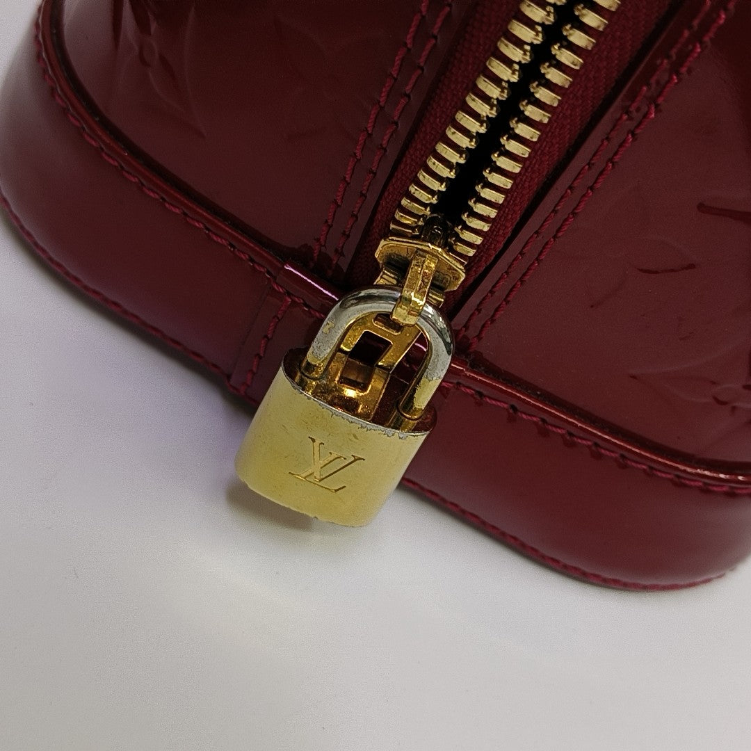 ALMA PM Monogram Patent Leather Red