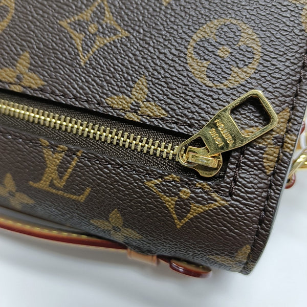 MÉTIS EAST WEST Monogram Coated Canvas Brown