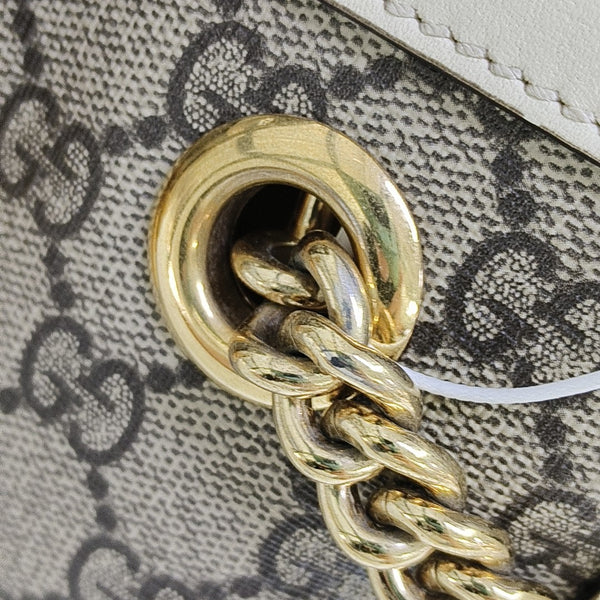 Padlock Small Monogram Coated Canvas Beige