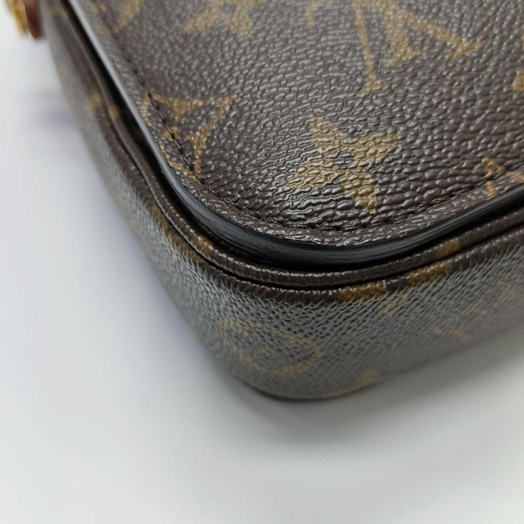MÉTIS MM Monogram Coated Canvas Brown