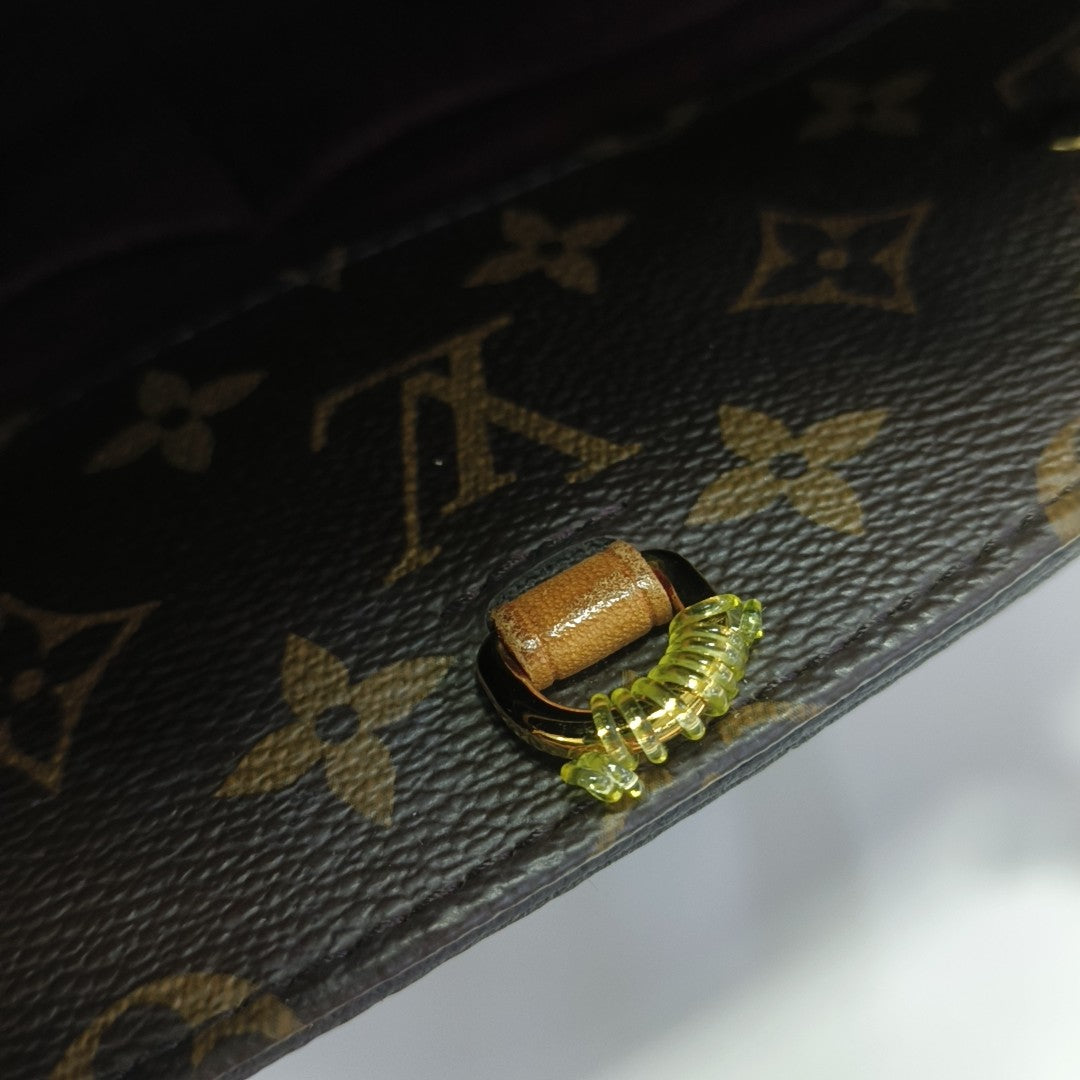 MONTAIGNE Monogram Coated Canvas Brown