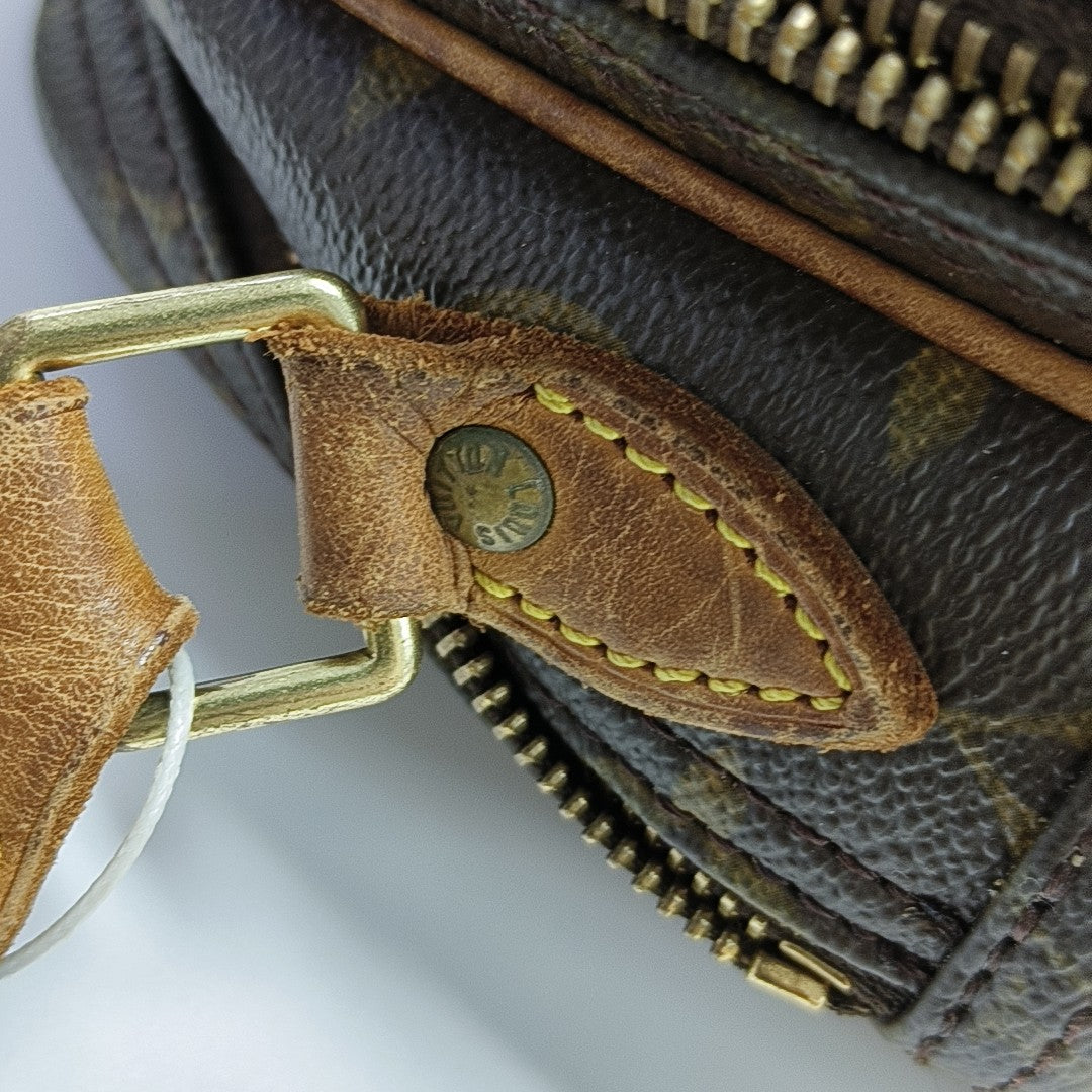 REPORTER PM Monogram Coated Canvas Brown
