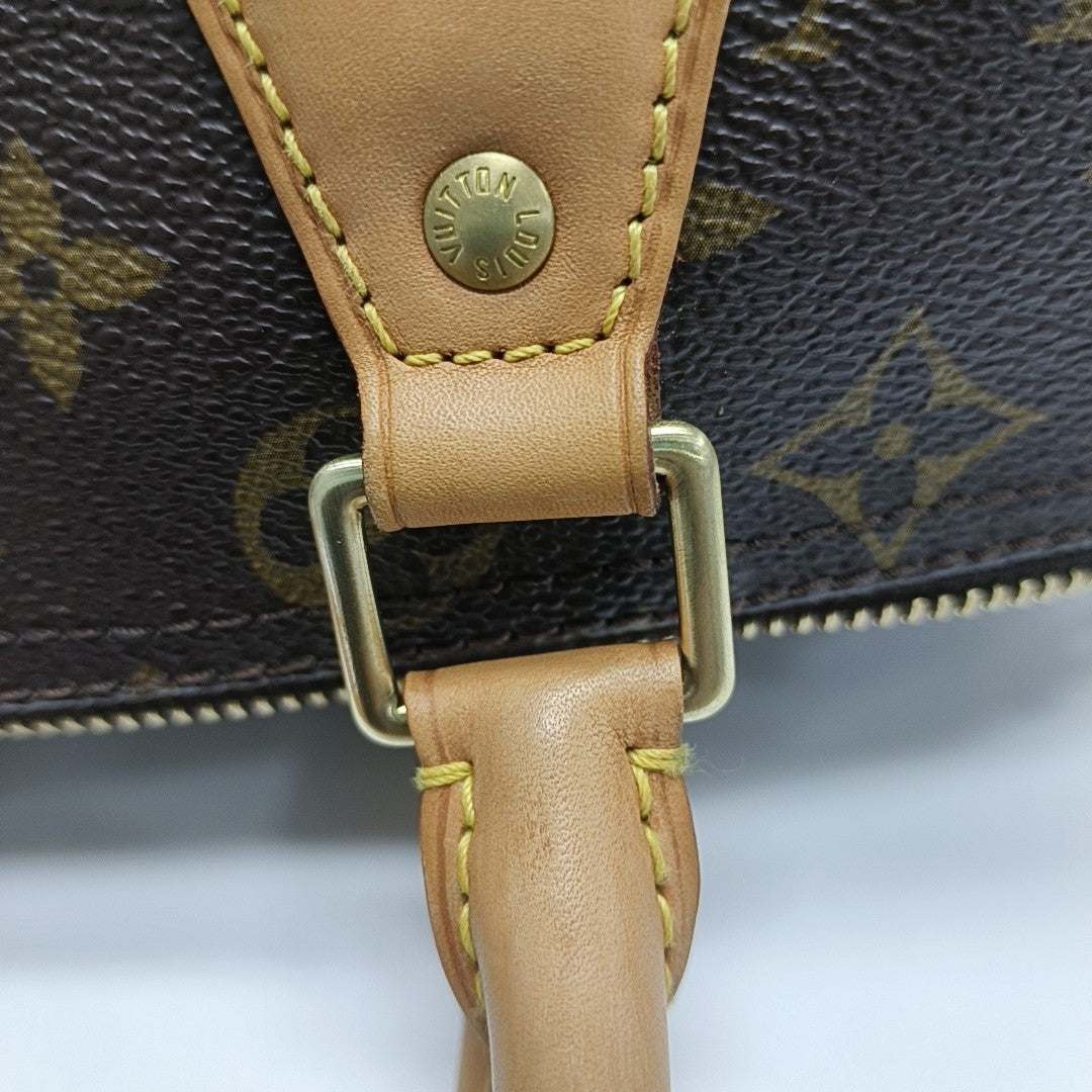 SPEEDY 25 Monogram Coated Canvas Brown