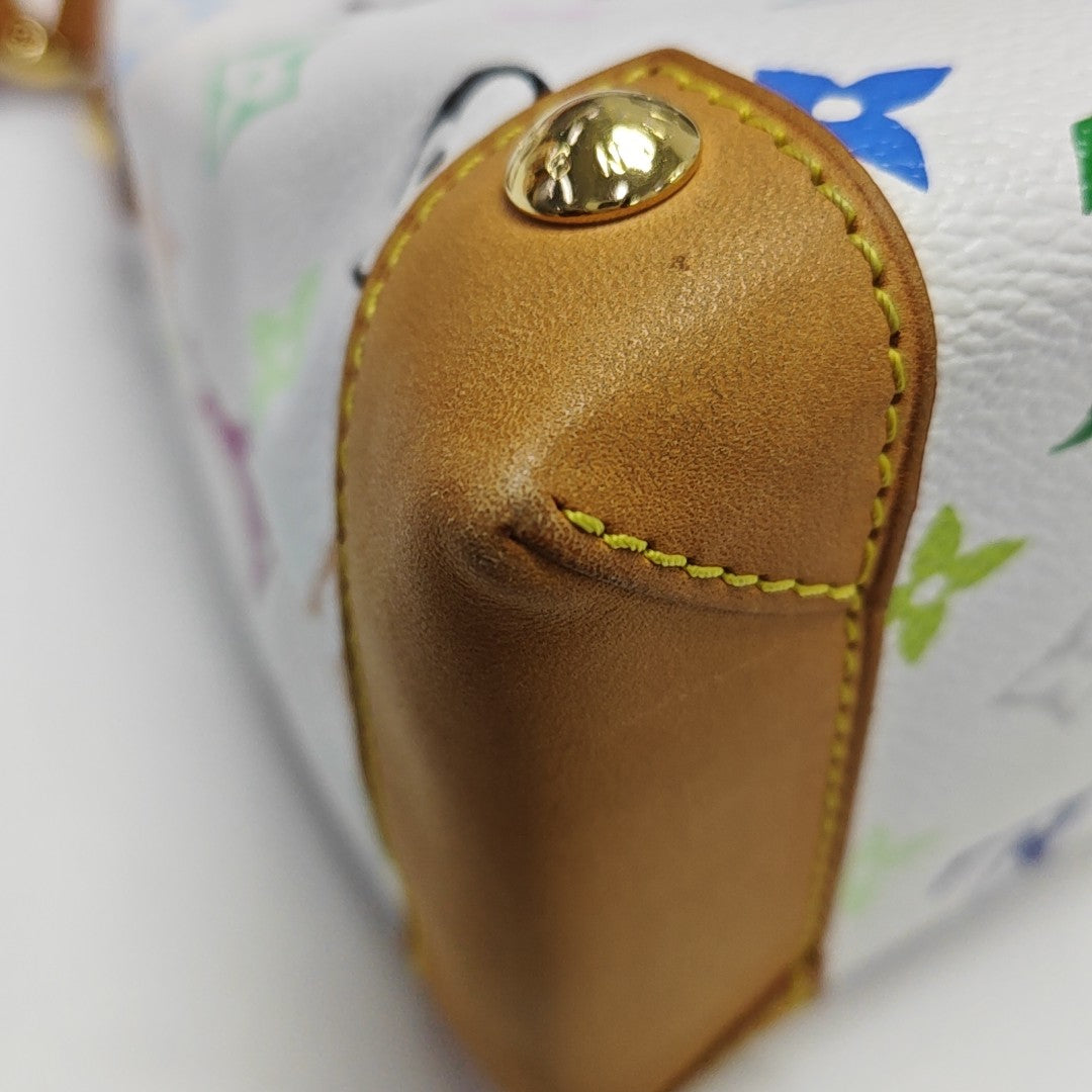 LV × TM ELIZA Monogram Coated Canvas White