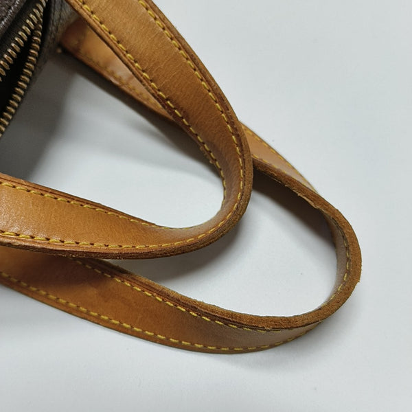 EXCURSION Monogram Coated Canvas Brown