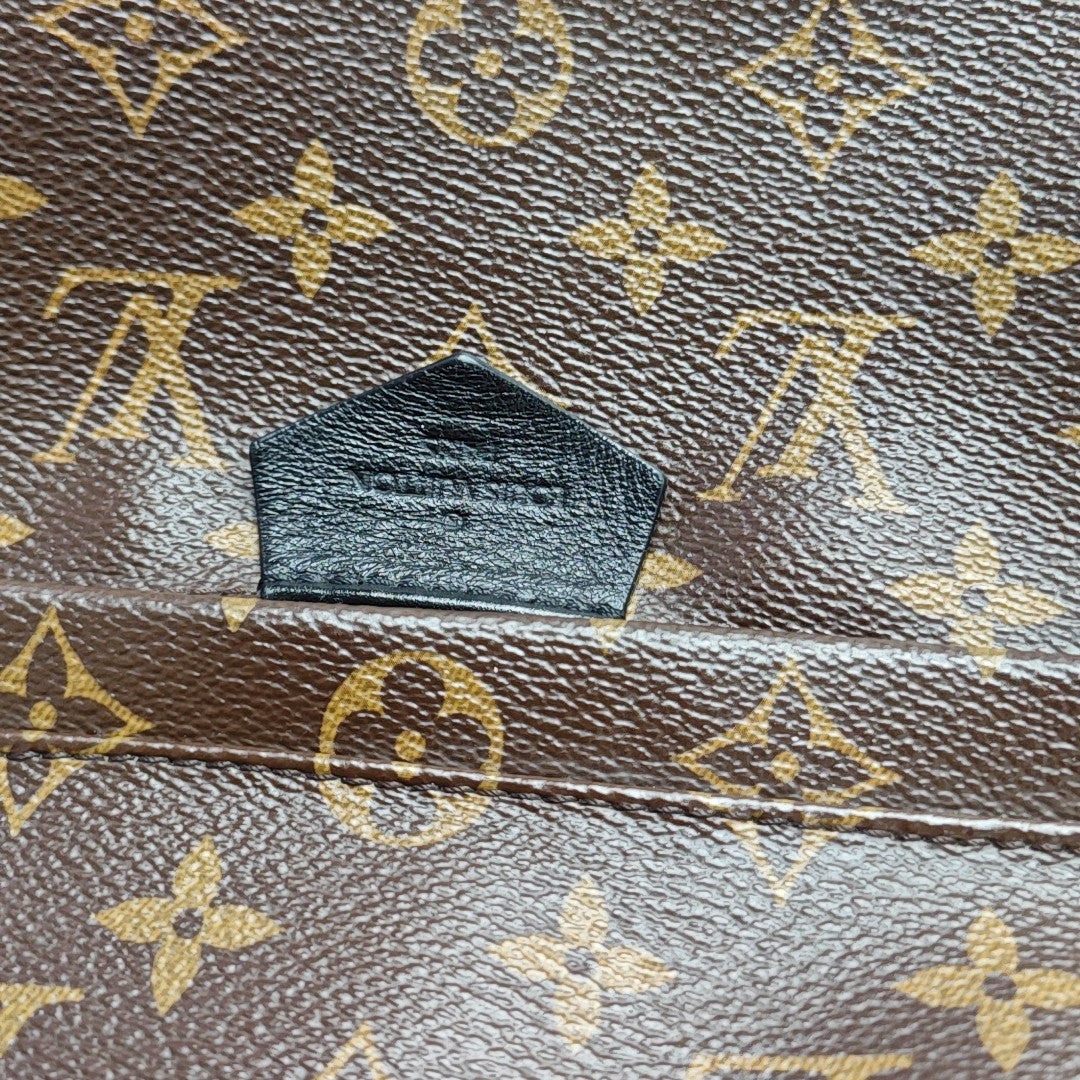 Monogram Coated Canvas Backpack Brown