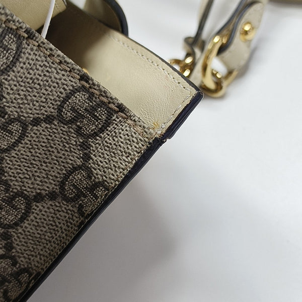 Padlock Small Monogram Coated Canvas Beige