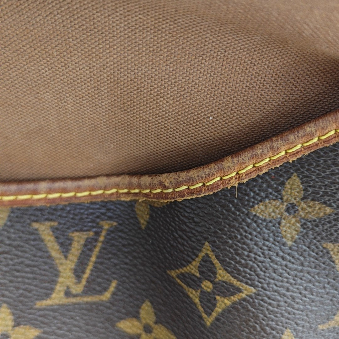 SAUMUR Monogram Coated Canvas Brown