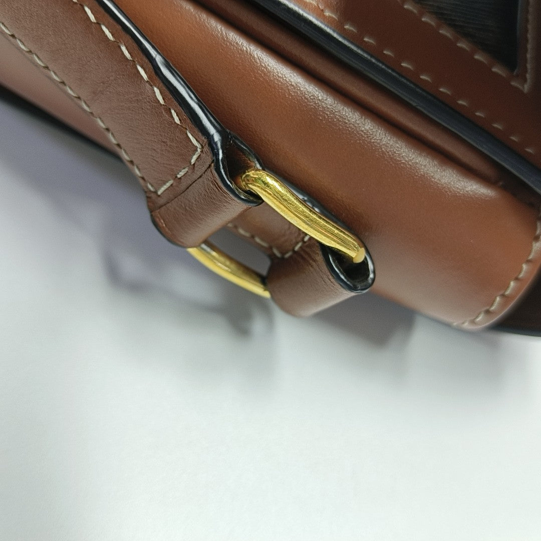 TRIOMPHE Small Coated Canvas Brown