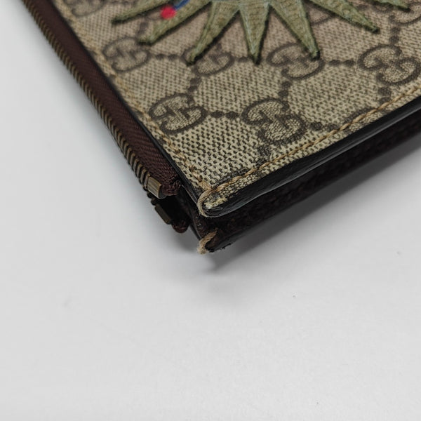 Monogram Coated Canvas Clutch Beige