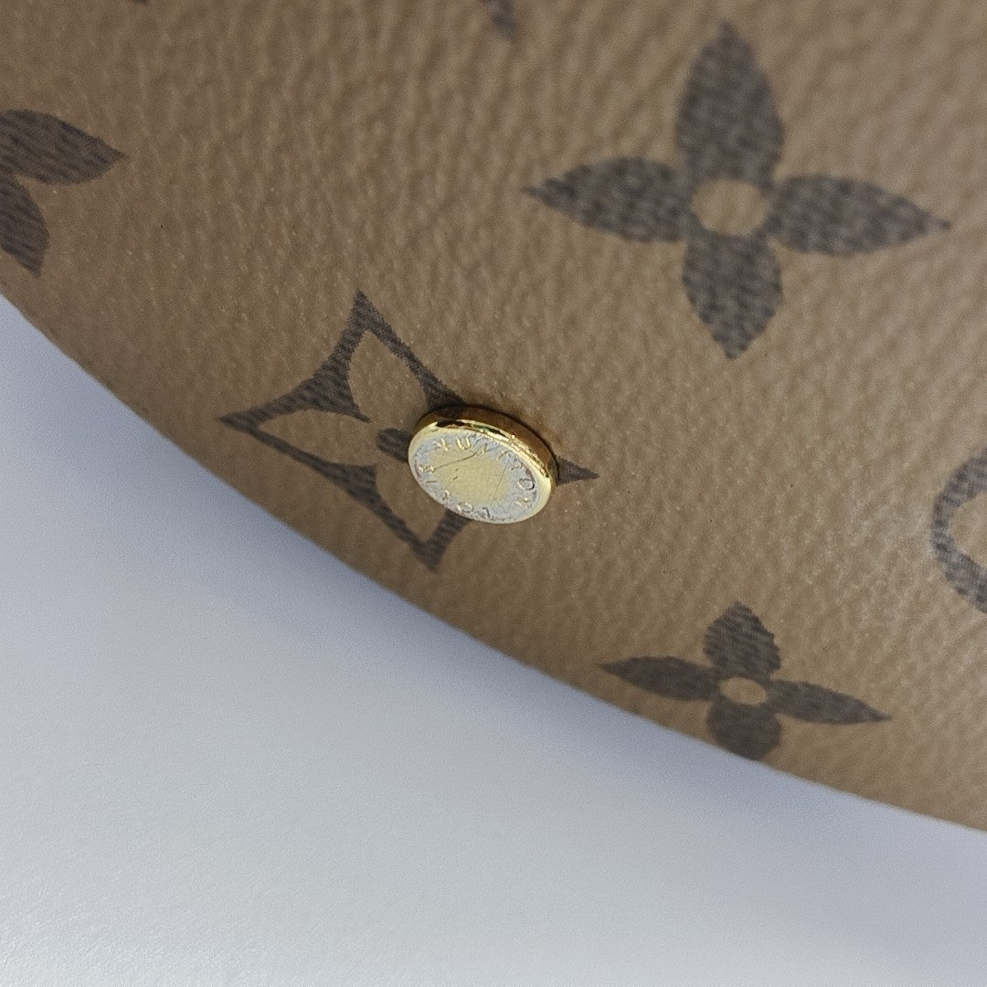 CANNES PM Monogram Coated Canvas Brown