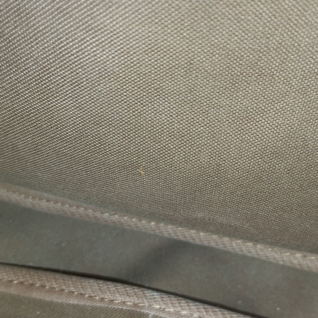 SAUMUR Monogram Coated Canvas Brown