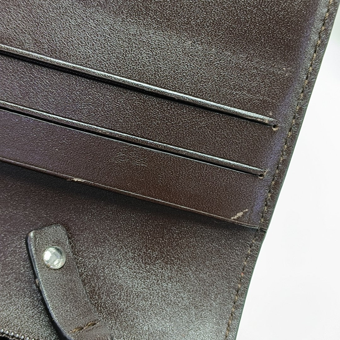 Monogram Leather Clutch Gray