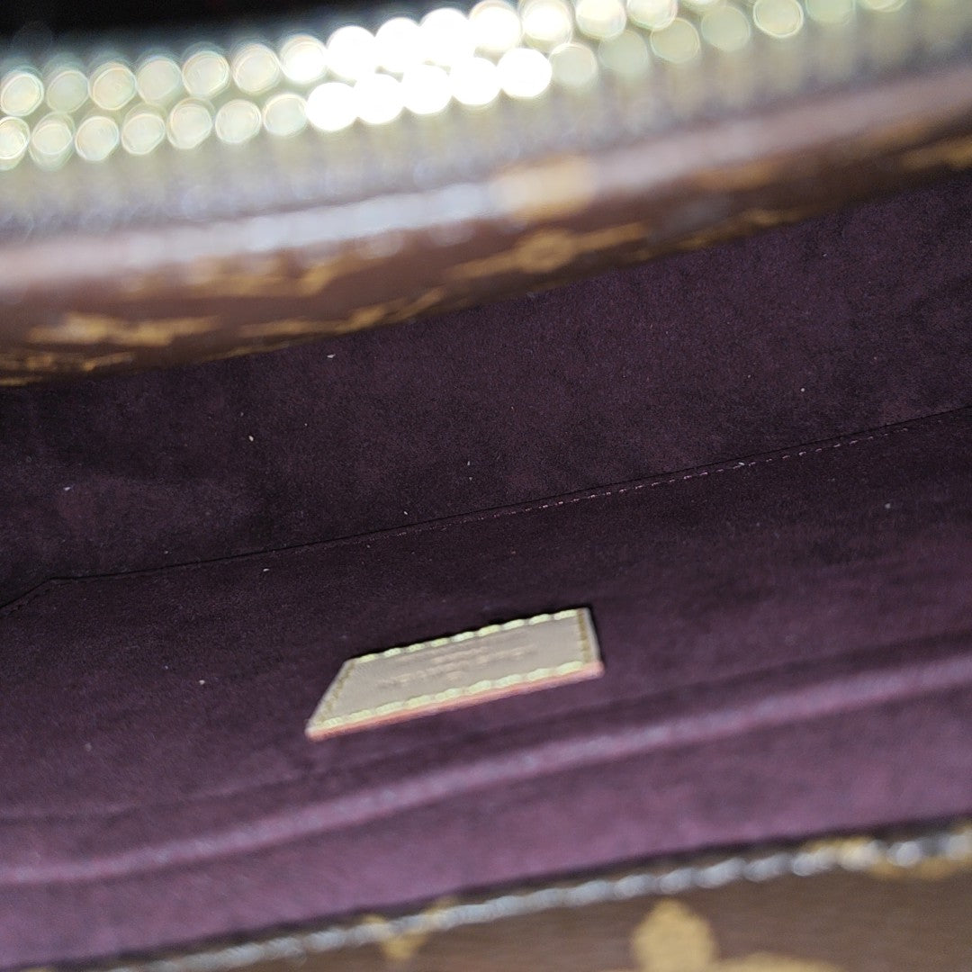 MONTAIGNE Monogram Coated Canvas Brown