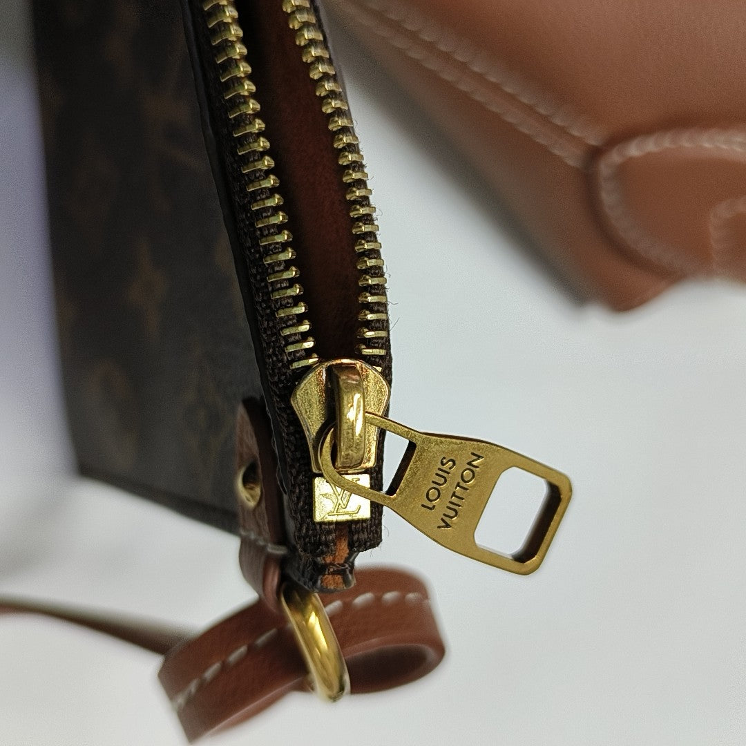 LOW KEY HOBO PM Monogram Calfskin Brown