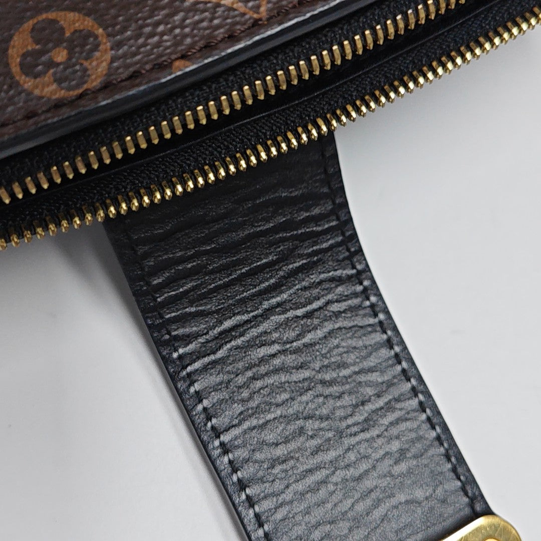 TRUNK Monogram Coated Canvas Brown