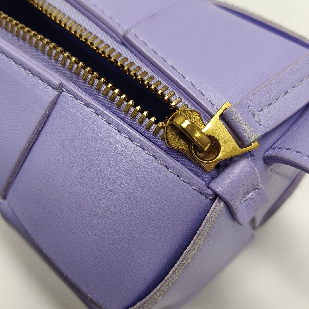 Authenticated pre-owned  Intrecciato Small Lambskin Purple - Top Handle Bag at Looply