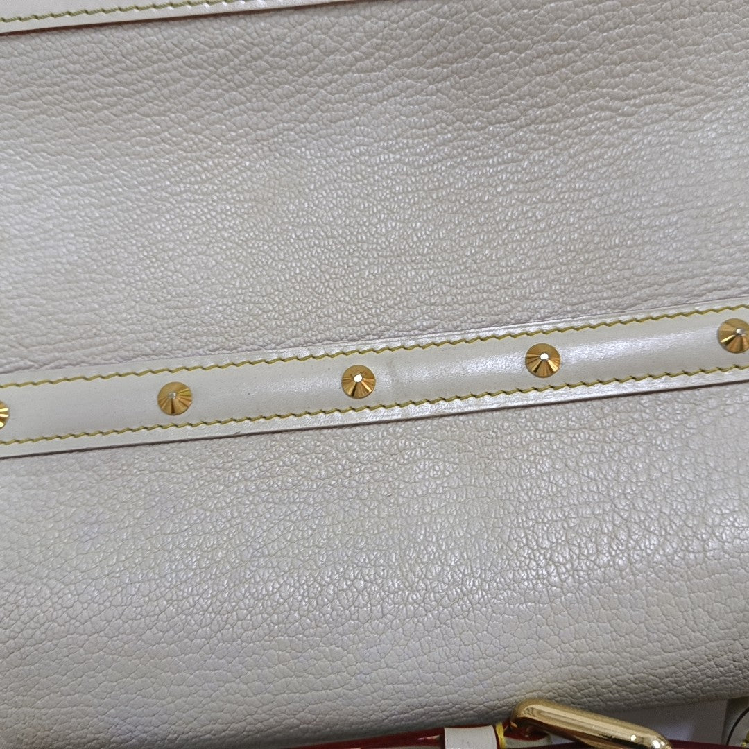 LE TALENTUEUX Calfskin White