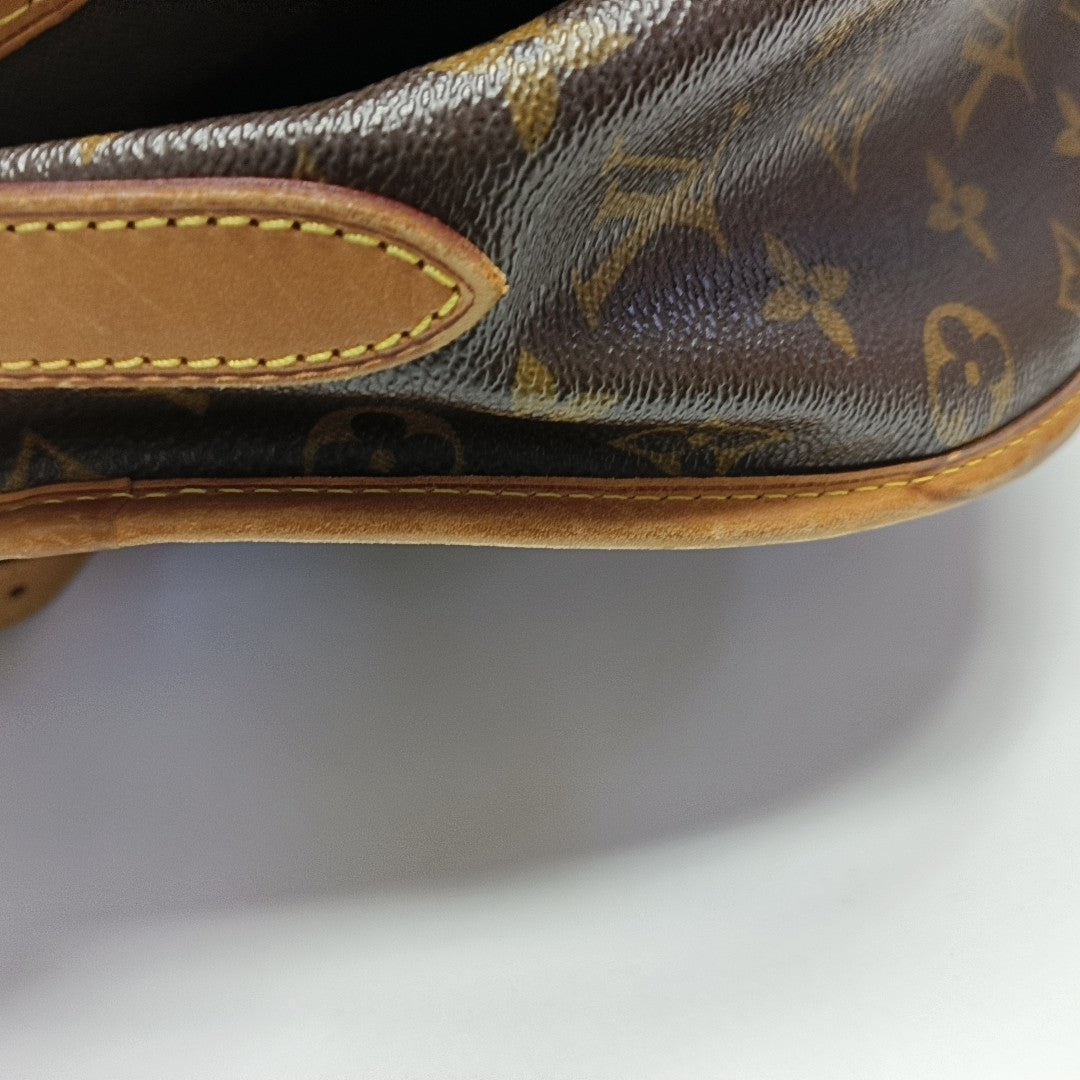 MENILMONTANT MM Monogram Coated Canvas Brown
