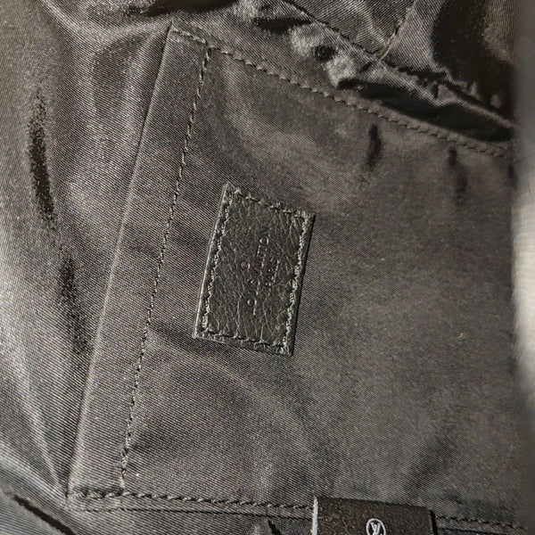 PALM SPRINGS Mini Monogram Coated Canvas Brown