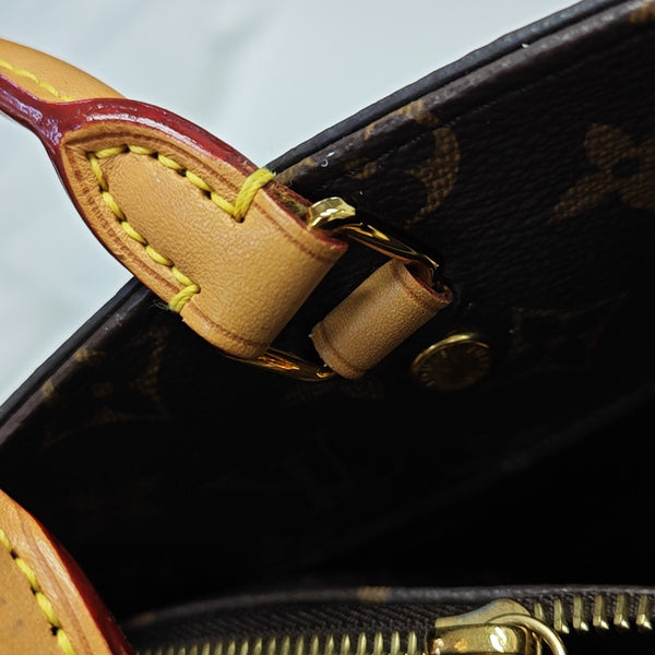 MONTAIGNE GM Monogram Coated Canvas Brown