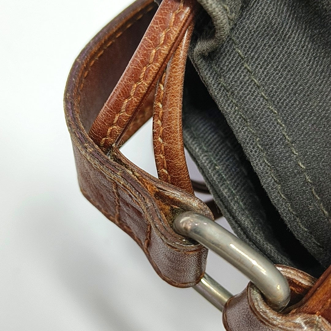 Authenticated pre-owned  TRIOMPHE Canvas Brown - Bucket Bag at Looply
