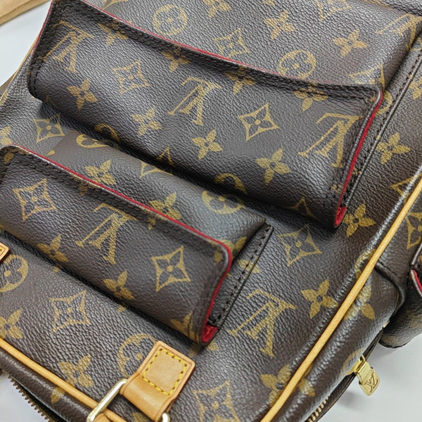 EXCENTRI-CITE Monogram Coated Canvas Brown