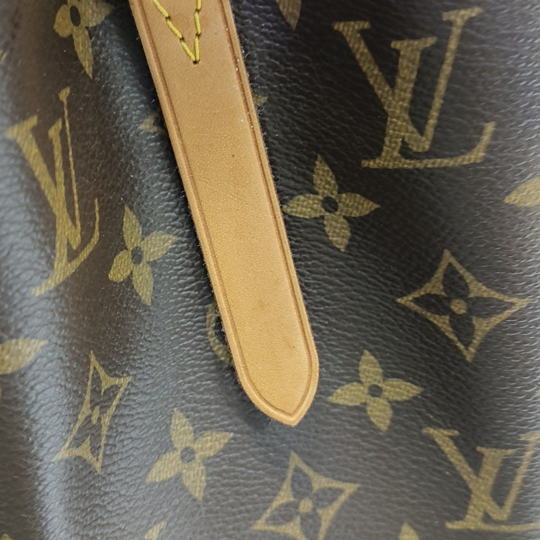 MONTAIGNE GM Monogram Coated Canvas Brown