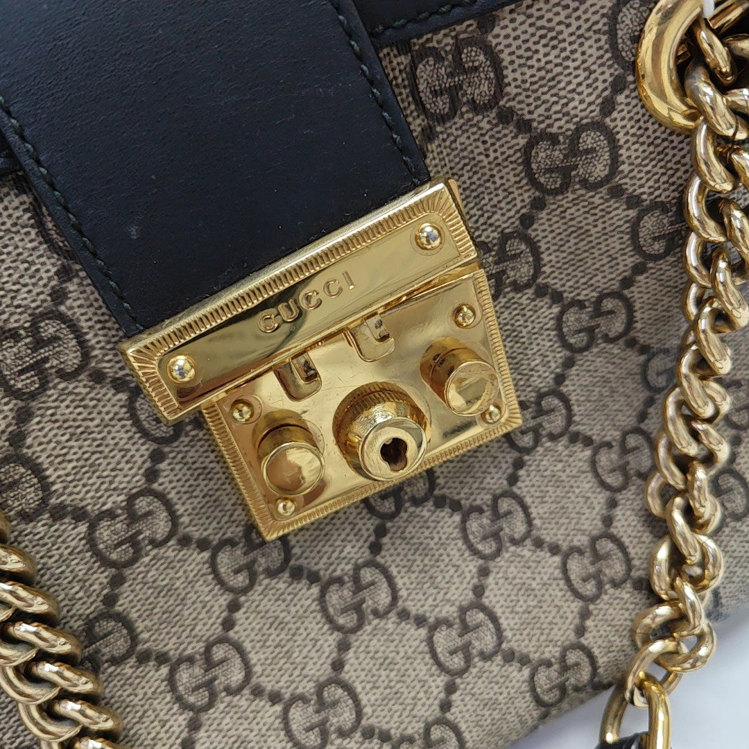 Candado pequeño Monogram lona revestida beige