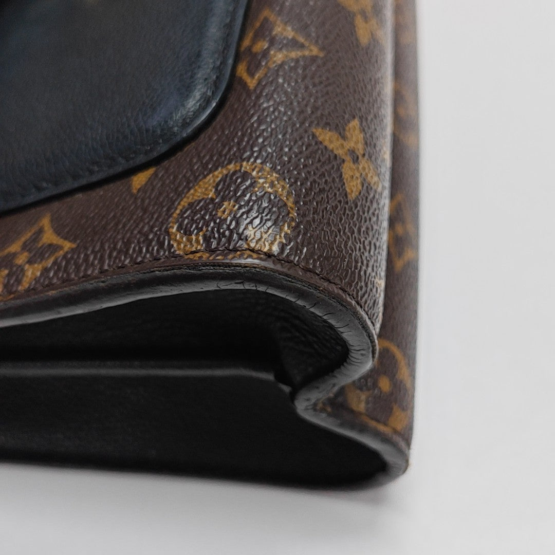 VICTOIRE Monogram Coated Canvas Brown