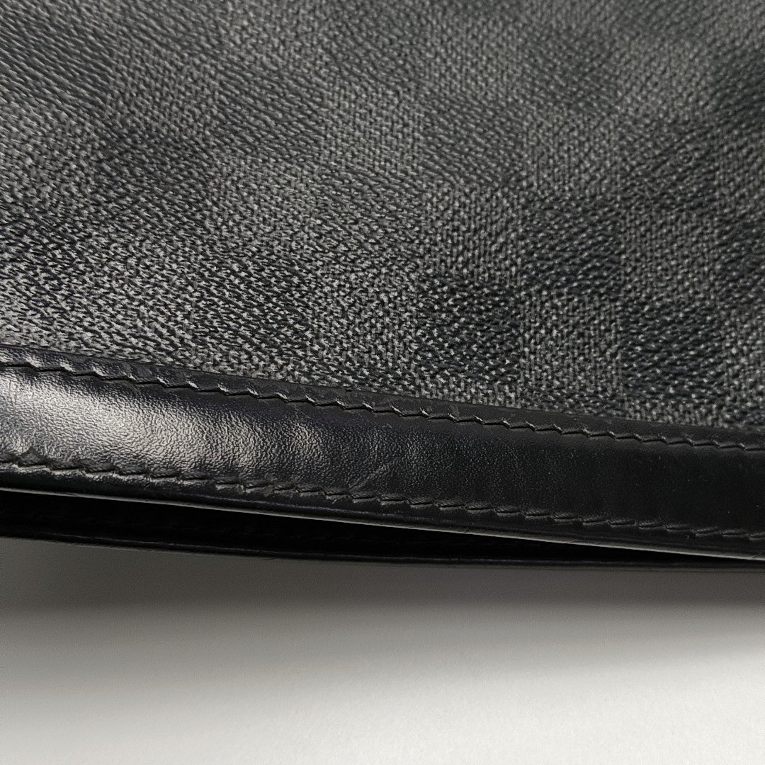 Pochette Voyag MM Damier Graphite Coated Canvas Gray
