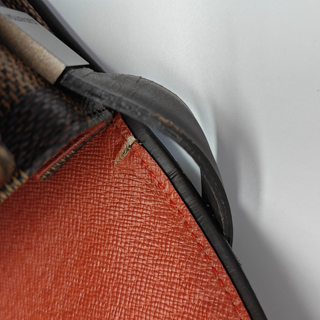 TRIBECA Damier Ebene Coated Canvas Brown