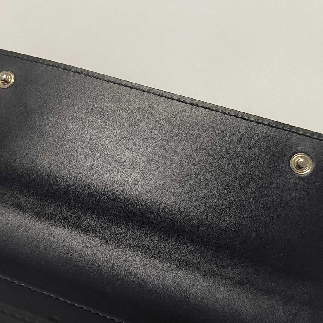 Monogram Calfskin Clutch Blue
