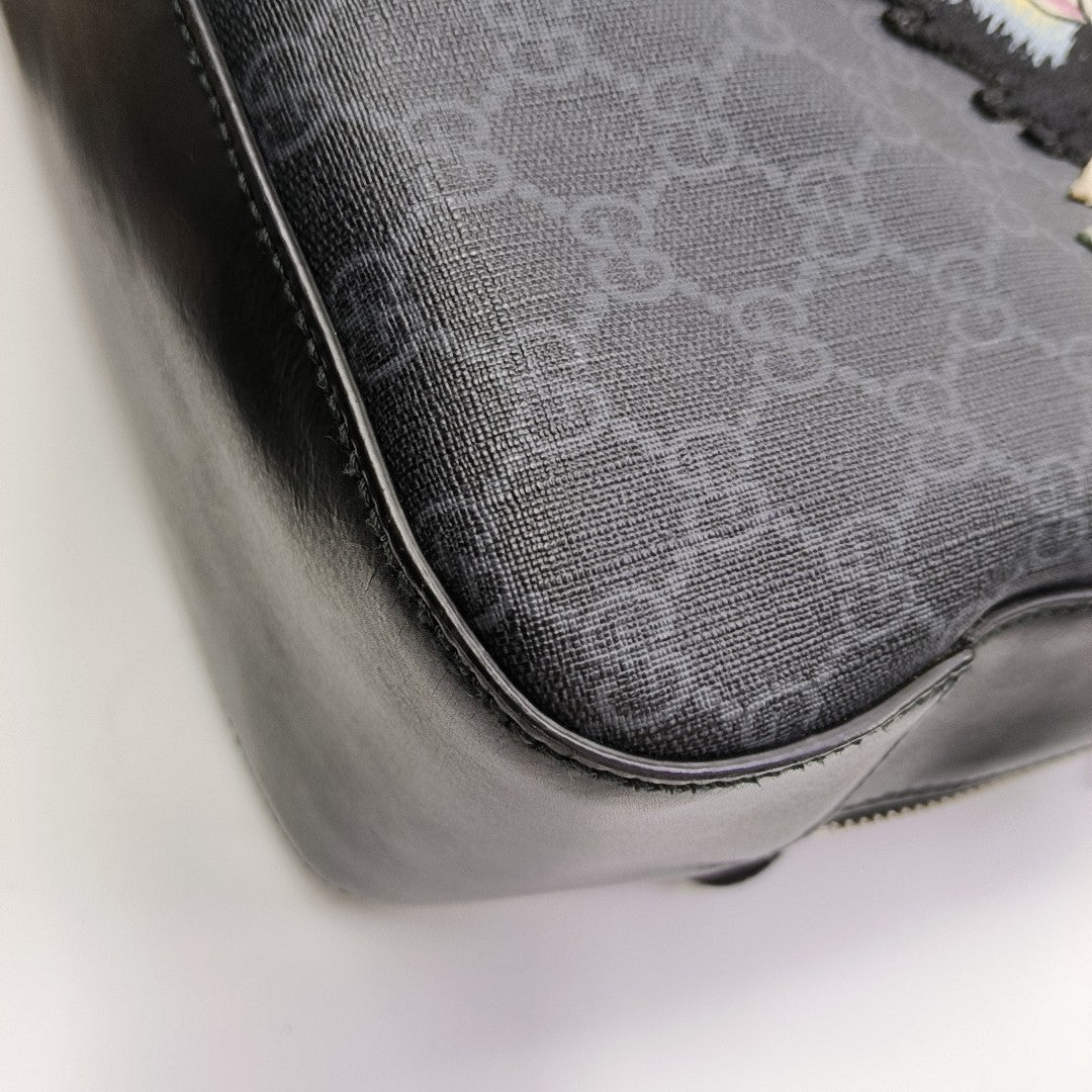 Monogram Coated Canvas Backpack Black