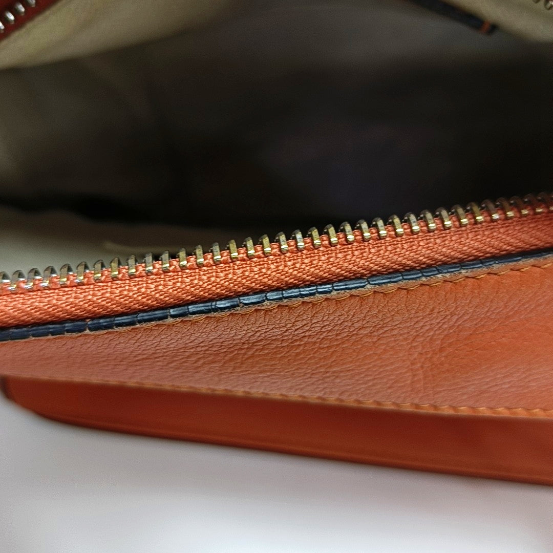 Authenticated pre-owned  Puzzle Calfskin Orange - Shoulder Bag at Looply