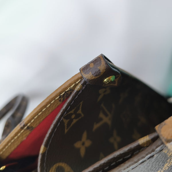 ONTHEGO MM Monogram Coated Canvas Brown