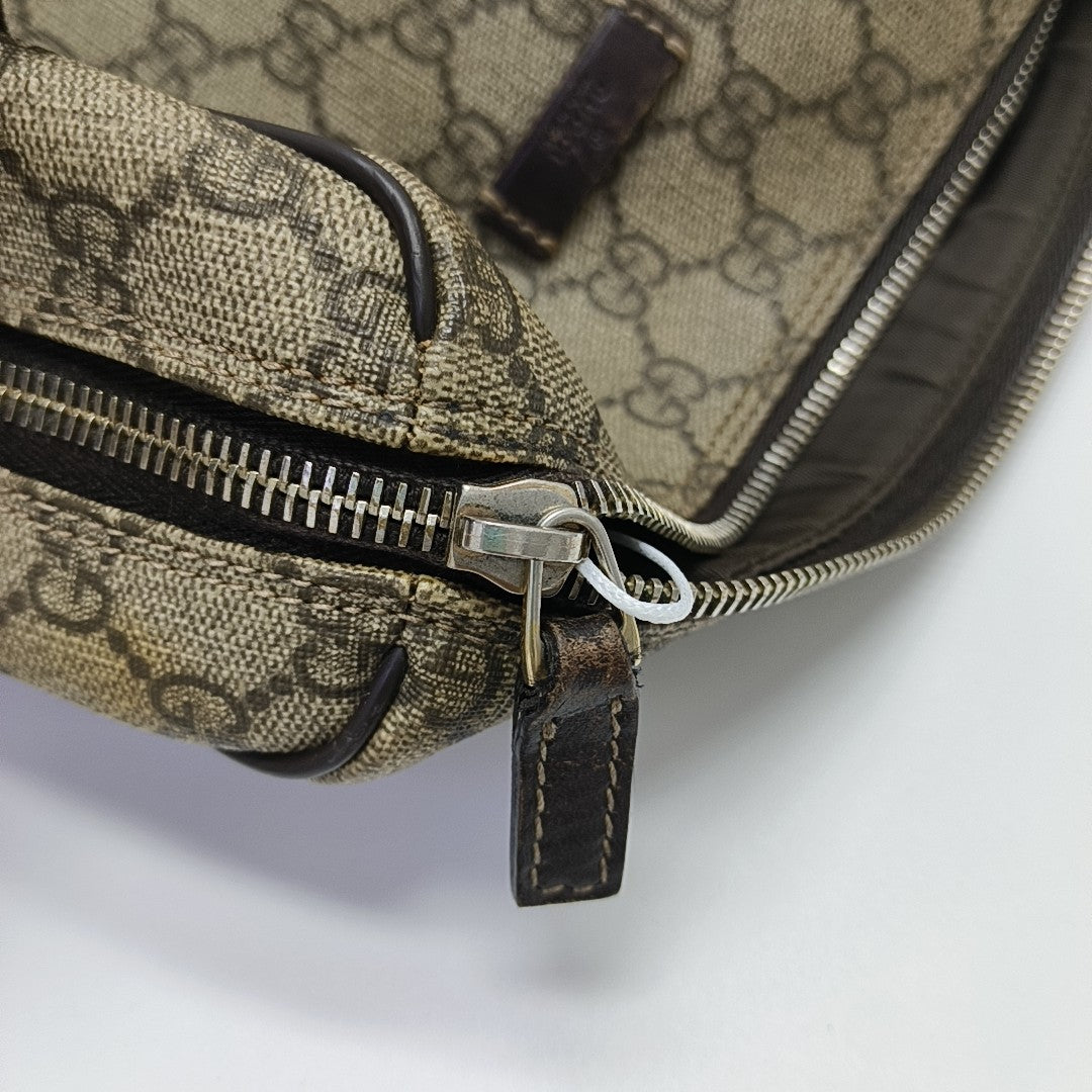 Monogram Coated Canvas Clutch Brown