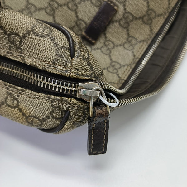 Monogram Coated Canvas Clutch Brown