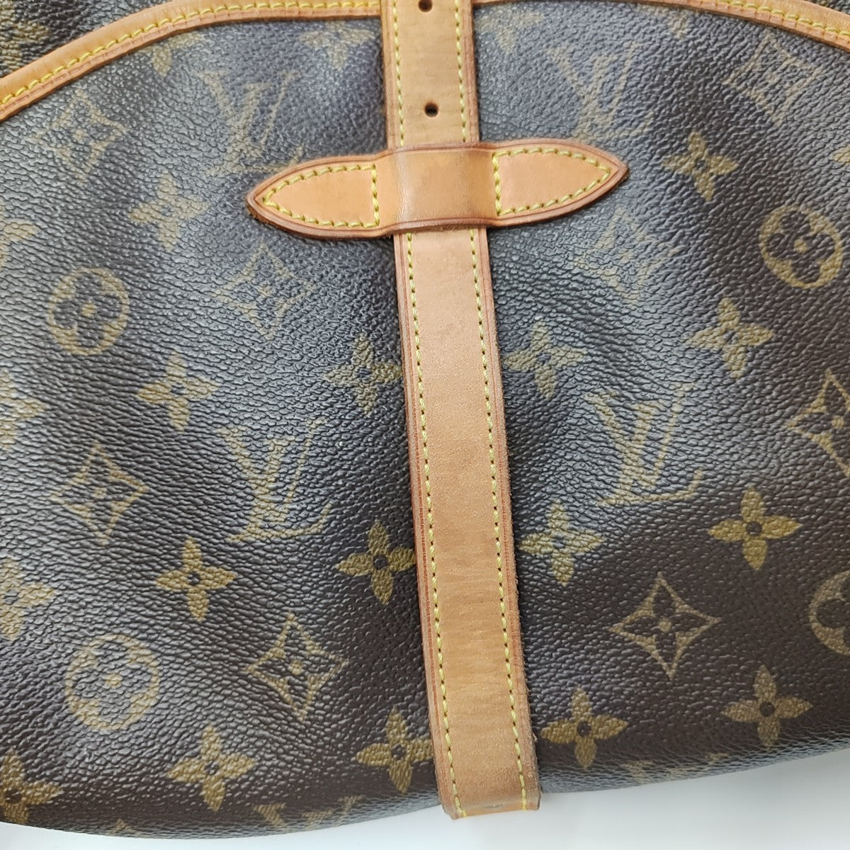 SAUMUR Monogram Coated Canvas Brown
