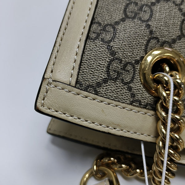 Padlock Small Monogram Coated Canvas Beige
