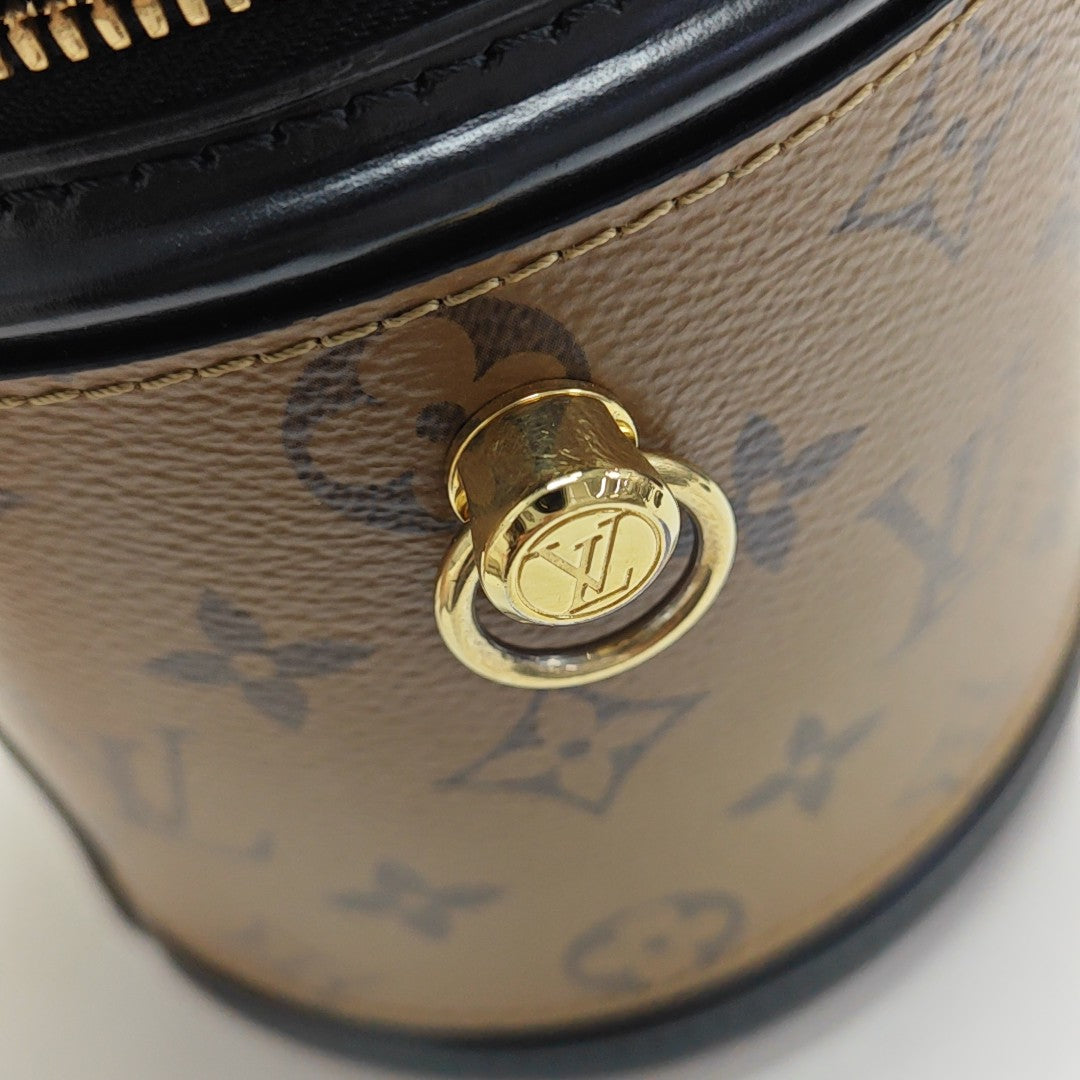 CANNES PM Monogram Coated Canvas Brown