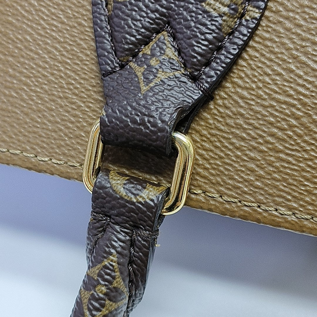 ONTHEGO MM Monogram Coated Canvas Brown