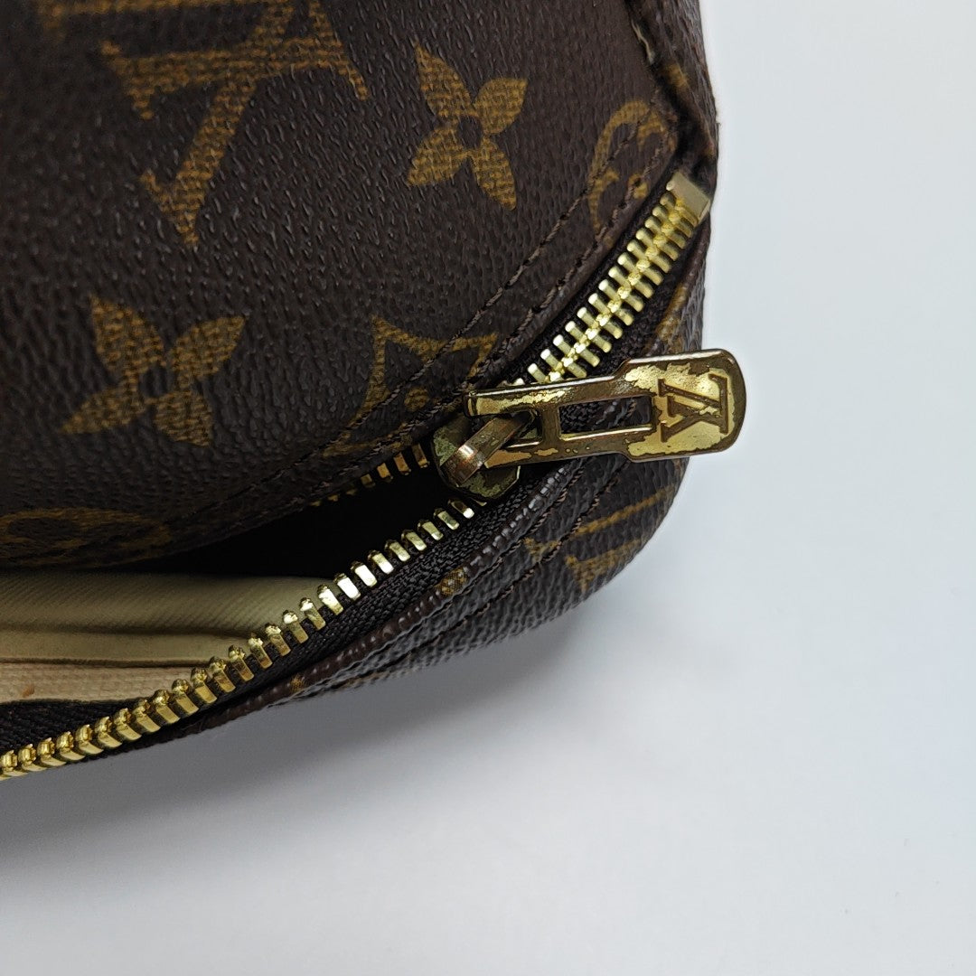 EXCURSION Monogram Coated Canvas Brown