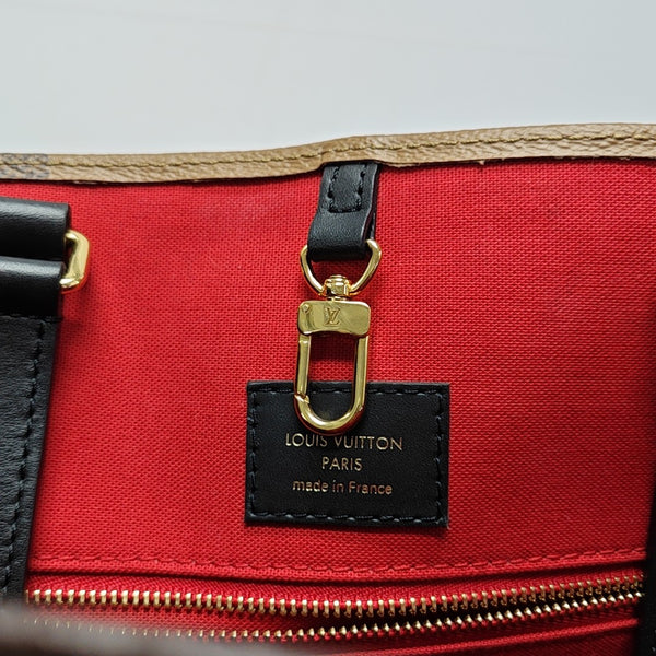 ONTHEGO GM Monogram Coated Canvas Brown
