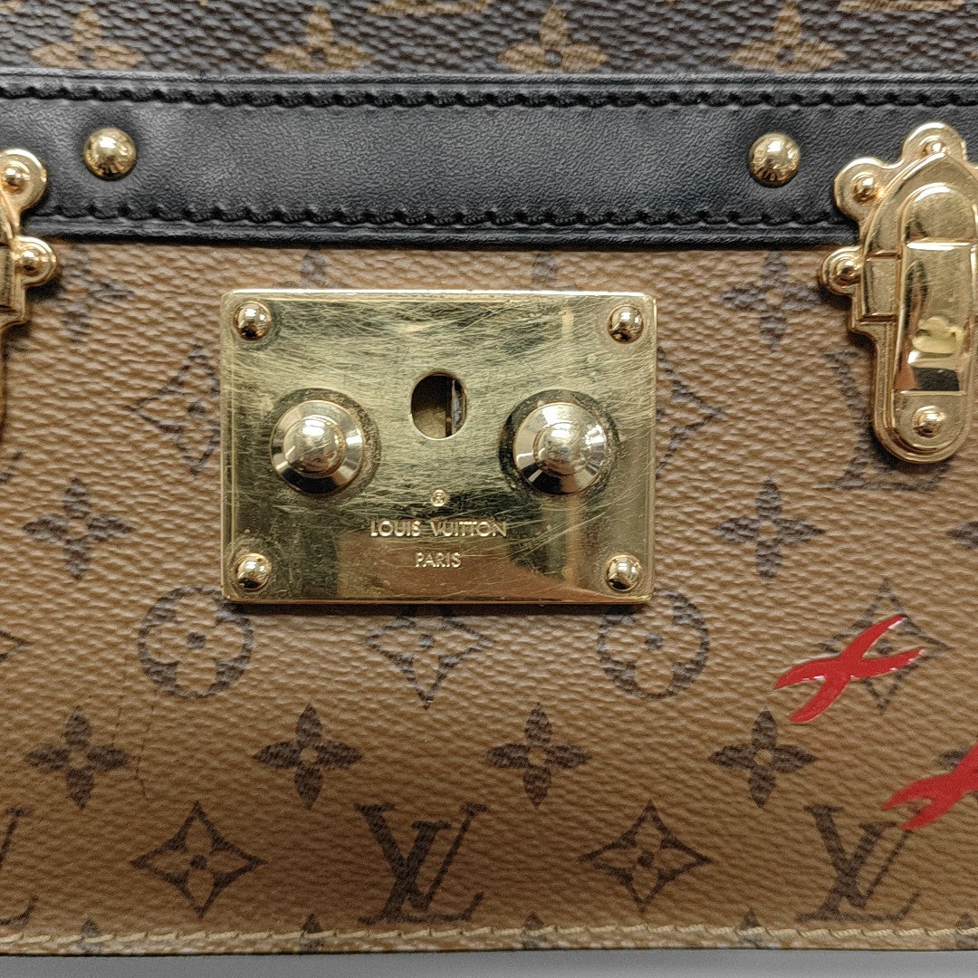 TRUNK Monogram Coated Canvas Brown