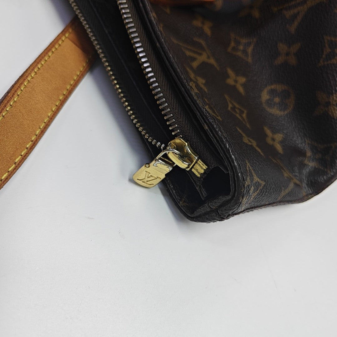 PIANO Monogram Coated Canvas Brown