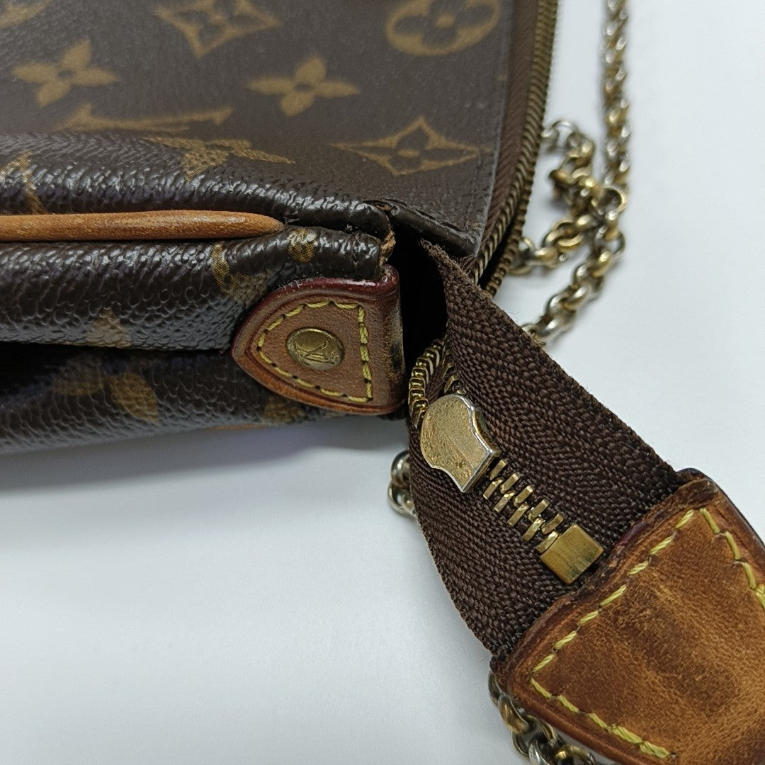 EVA Monogram Coated Canvas Brown