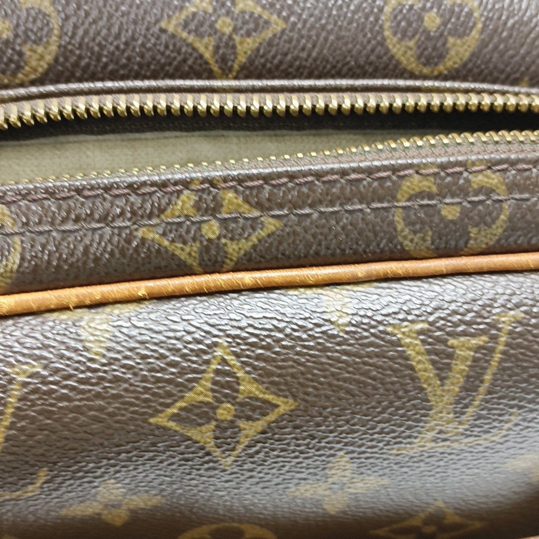 REPORTER Monogram Coated Canvas Brown
