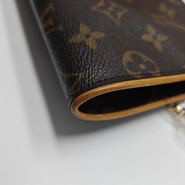 EVA Monogram Coated Canvas Brown