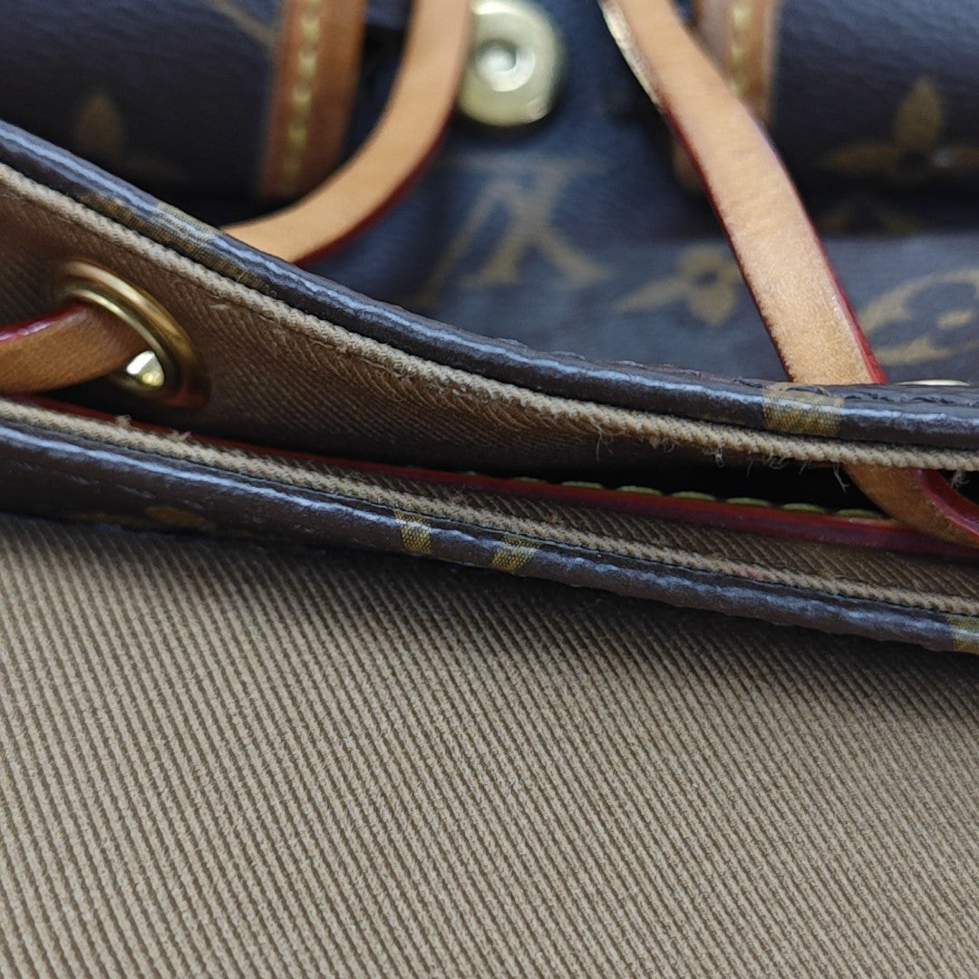 EXCURSION PM Monogram Coated Canvas Brown